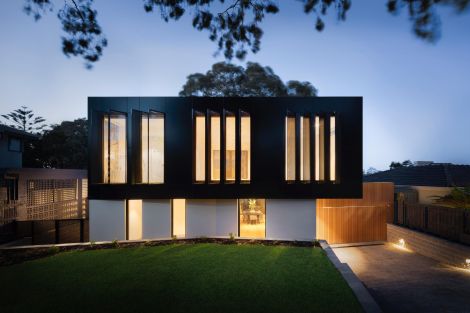 Modern house with the lights on